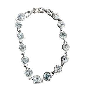 Vintage Avon Silver and Clear Glass or Crystal Studded Tennis Bracelet